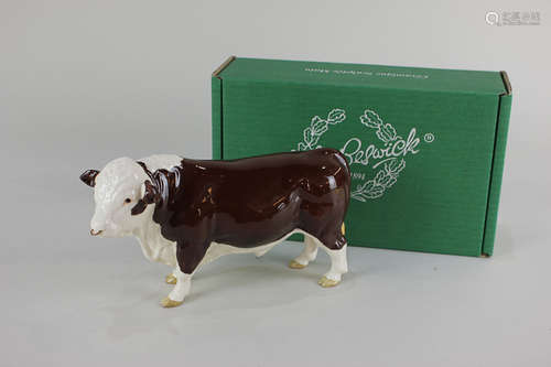 A Beswick model of a Polled Hereford Bull, in brown and white gloss, with ringed nose, 13cm, with