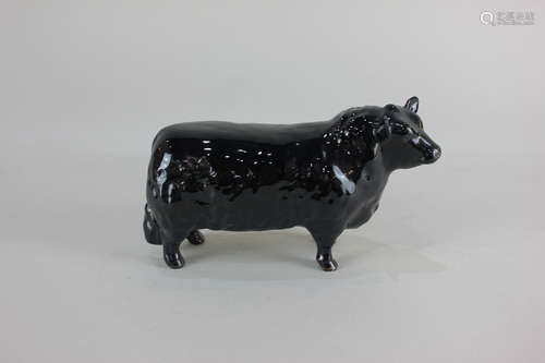 A Beswick model of an Aberdeen Angus bull, in black gloss, 11cm, without box