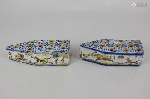 A pair of 19th century Delft polychrome pottery incense holders depicting animals and buildings,