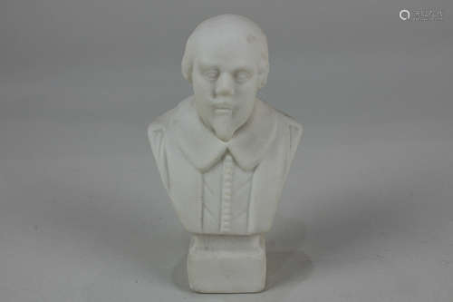 A Parian ware bust of William Shakespeare, initialled HKL, 10.5cm high