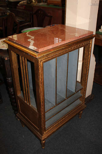 A 19th century carved gilt wood music cabinet, with later rose marble top, 60cm wide