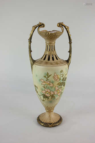 An early 20th century Bohemian porcelain baluster vase, marked Turn EW Vienna, decorated with floral