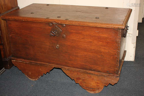 A Dutch chest on wheels, with rectangular studded lifting top and two cast iron handles, the moulded