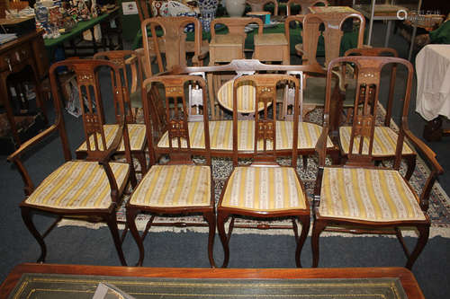 An Edwardian Art Nouveau seven-piece drawing room suite of settee, four single and two elbow