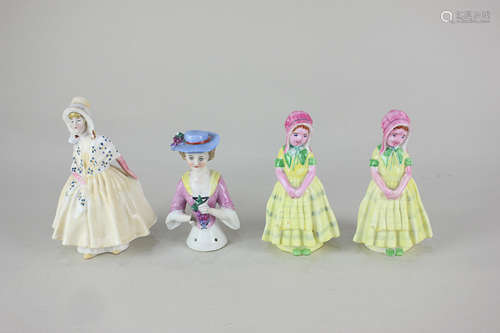 Three Royal Doulton porcelain figures, two Tootles and Lily, together with a porcelain half doll