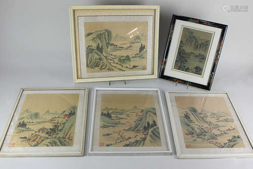 A collection of five framed Japanese pictures on silk, depicting mountainous river landscapes, all