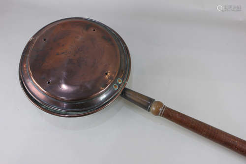 A Victorian copper warming pan, with decorated lid, 108cm (a/f)