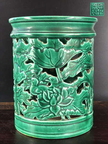 A GREEN GLAZE HOLLOW LOTUS DESIGN BRUSH POT