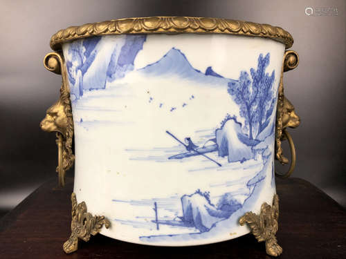 A COPPER DECORATED BLUE AND WHITE BRUSH POT