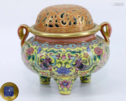 A GILT ENAMELED FLORAL PATTERN TRIPOD CENSER