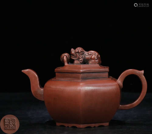 A HEXAGONAL SHAPED TEAPOT