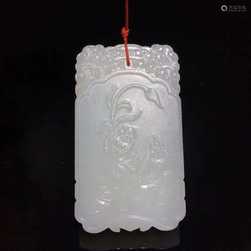 A WHITE JADE CARVED INSCRIPTION PENDANT