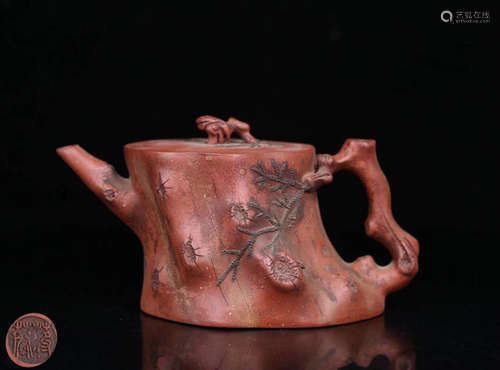 A WOOD SHAPED ZISHA TEAPOT WITH MARK