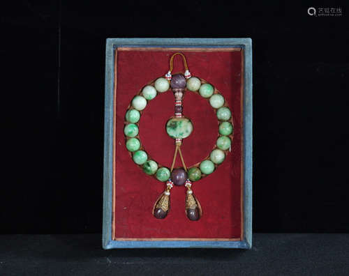 A JADEITE BEADS STRING BRACELET