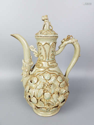 A CELADON GLAZE FLORAL DESIGN EWER