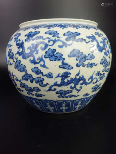 A BLUE AND WHITE CLOUD PATTERN JAR