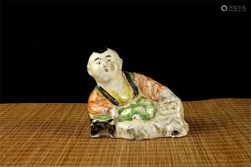 A Chinese Famille-Rose Porcelain Figure of A Boy