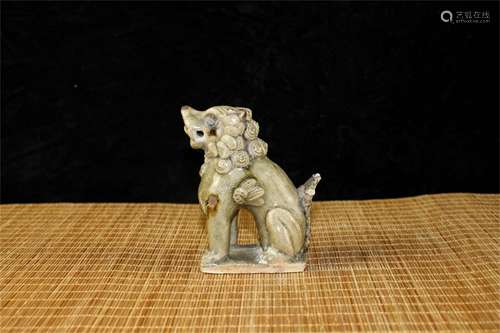 A Chinese Celadon Porcelain Foo Dog