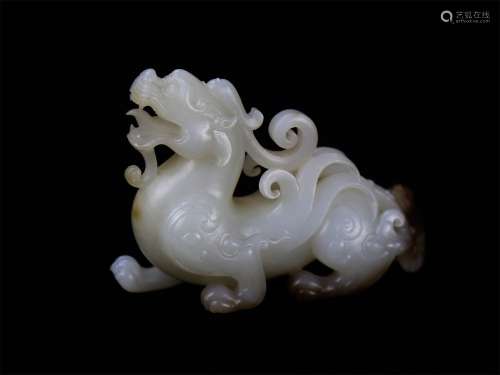 A Chinese Carved Jade Foo Dog