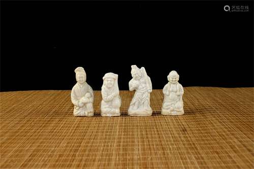 A Set of Four White Glazed Porcelain Figure