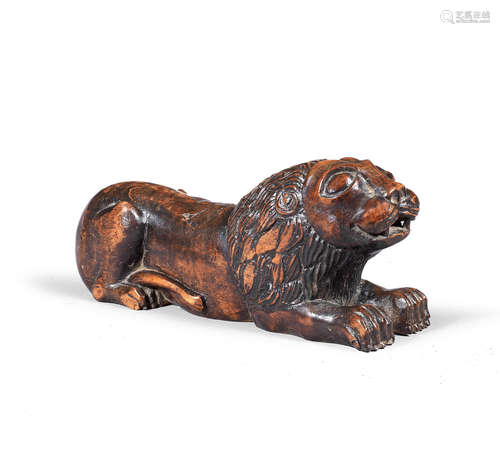 A 17th century carved walnut finial