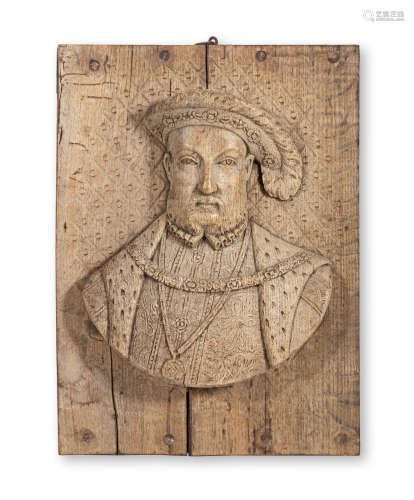 An oak carving of Henry VIII, English