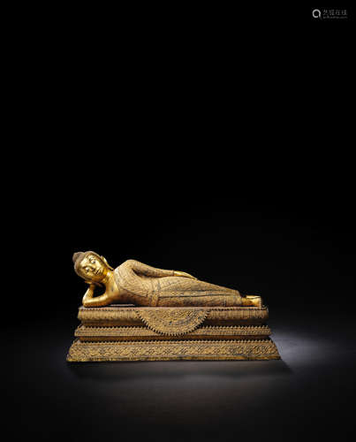 Bangkok/Rattanakosin first period 1782-1851 CE A COPPER ALLOY AND LACQUER GILT FIGURE OF THE BUDDHA IN PARINIRVANA