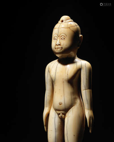 Myanmar or Thailand, 18-19th century AN IVORY FIGURE OF A BOY