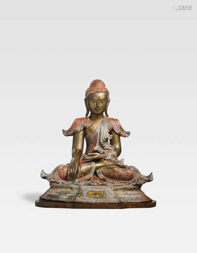 Myanmar, Mandalay period (1853-1948 CE) A COPPER ALLOY AND LACQUER SEATED BUDDHA IN MARAVIJAYA