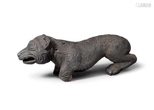 Possibly Medieval A carved oak sculpture of a hound or bear