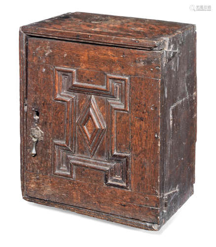 A Charles II painted 'turtle-shell' and joined oak table spice cabinet, circa 1670