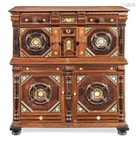 A Charles II joined oak, snakewood and rosewood veneered, mother-of-pearl and bone-inlaid enclosed chest of drawers, dated 1664