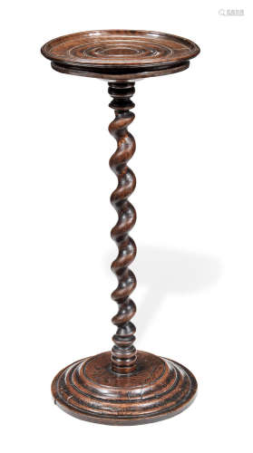 A late 17th century walnut or possibly bullet-wood and oak fully-turned candlestand, English, circa 1670-90