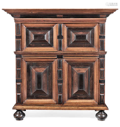 An impressive late 17th century joined oak, rosewood and ebony-veneered cupboard, Dutch