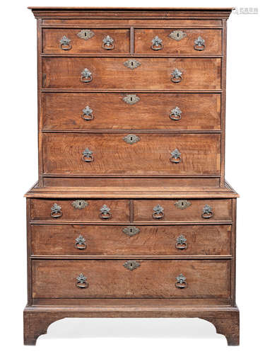 A George II joined oak and yew-wood chest-on-chest, circa 1730