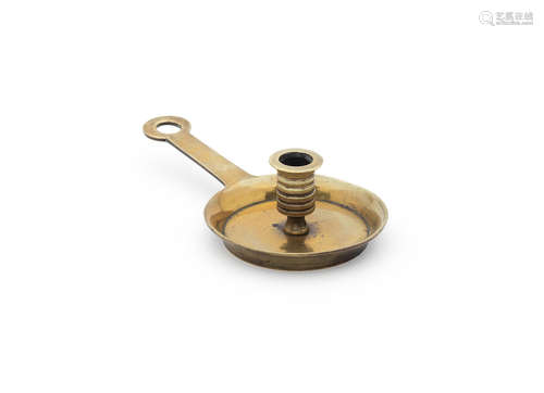 A late 17th century cast brass socket chamberstick, French, circa 1680