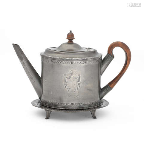 A George III/IV Britannia Metal teapot and matching stand