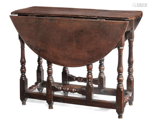 A joined solid yew-wood gateleg table, circa 1700