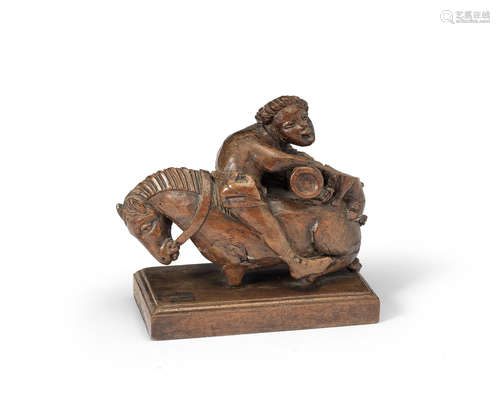 A 16th century carved chestnut figural fragment, French/Spanish