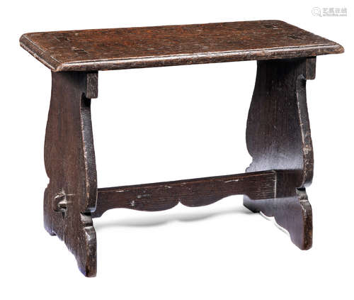 An oak boarded stool, English, circa 1700