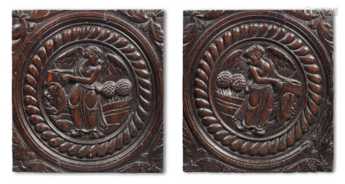 A pair of 17th century carved oak panels