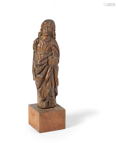 A late 16th/early 17th century carved beech figure of a saint