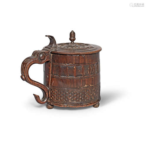 A rare mid-17th century engine-turned lignum vitae tankard, English, circa 1650