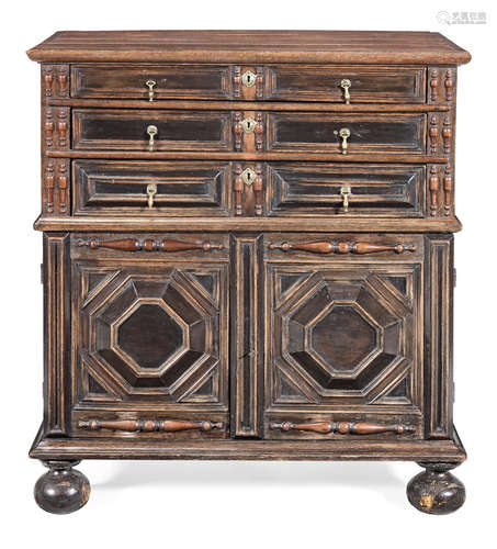 A Charles II joined oak, fruitwood and snakewood-veneered enclosed chest of drawers, circa 1670 and later