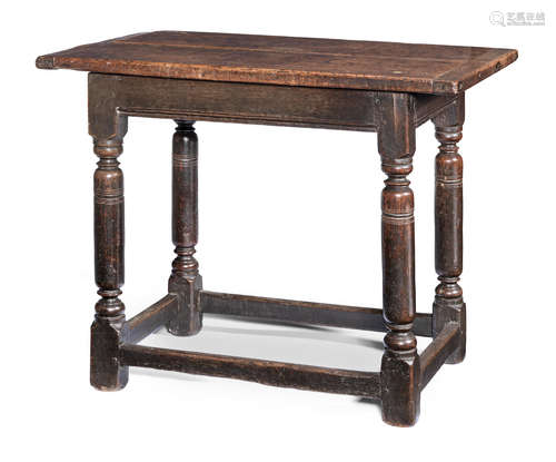 A rare James I cedar, walnut and oak centre table, West Country, circa 1620