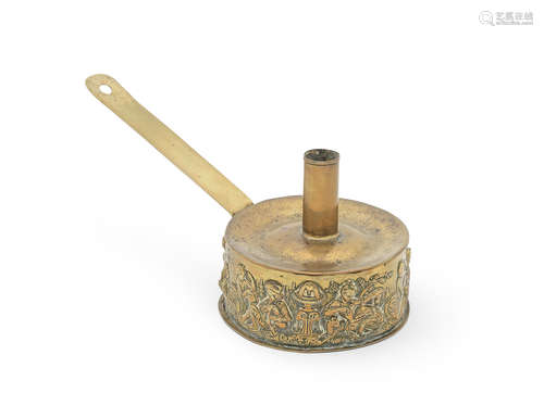 An unusual 18th/19th century copper and brass embossed tinderbox chamberstick, probably Dutch