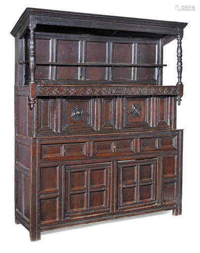 A rare James II joined oak canopy court cupboard, North Country, dated 1688