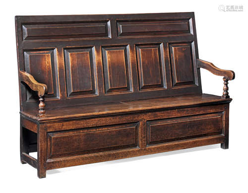 An early 18th century joined oak settle, English,  circa 1715