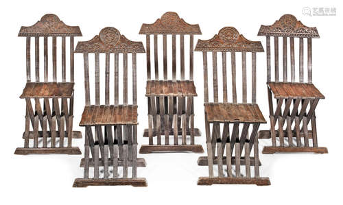 A set of five 16th/17th century walnut and beech folding-chairs, Italian, probably Tuscan, circa 1600