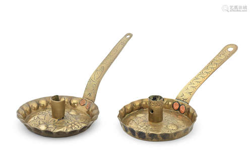 Two 17th/18th century embossed and cast brass socket chambersticks, Dutch